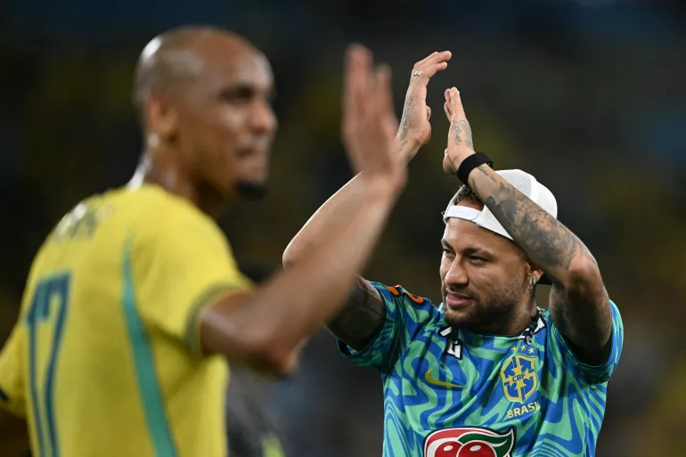 Brazil's forward Neymar acknowledges fans at the end of the international friendly football match between Brazil and Panama at the Maracana
